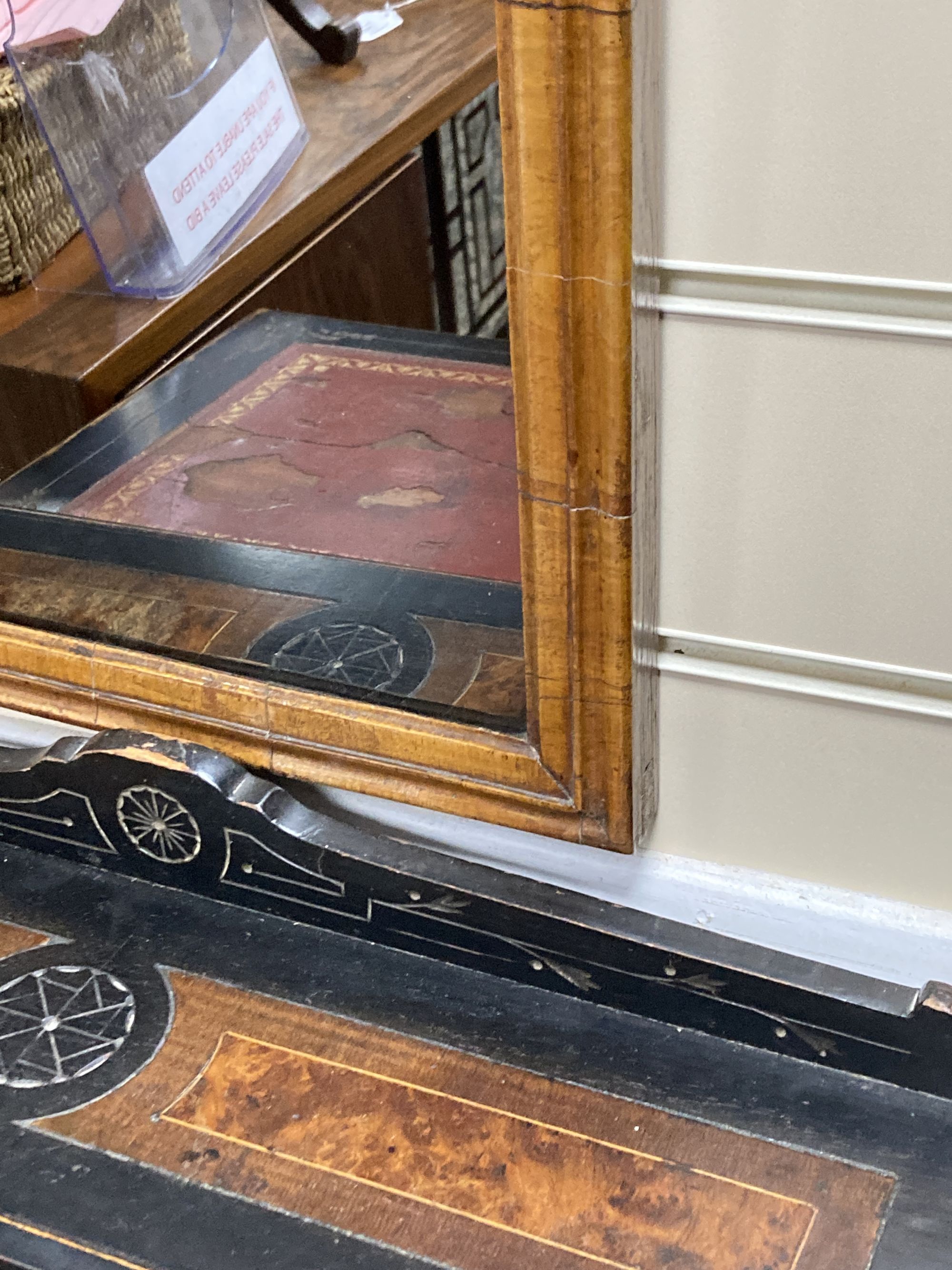 An 18th century walnut fret cut wall mirror, width 56cm, height 86cm